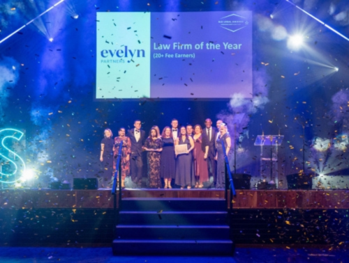 Image showing Howell Jones staff on stage winning Law Firm of the Year at the 2025 Surrey Law Society Awards.